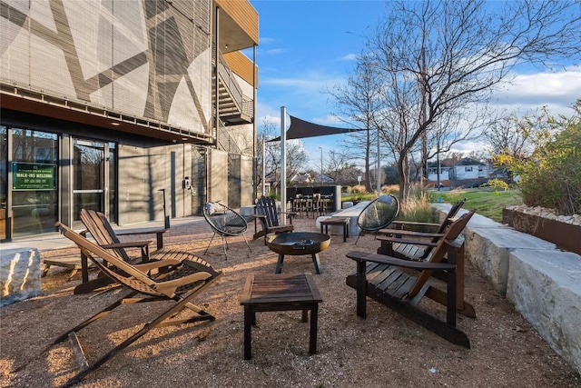 view of patio featuring a fire pit