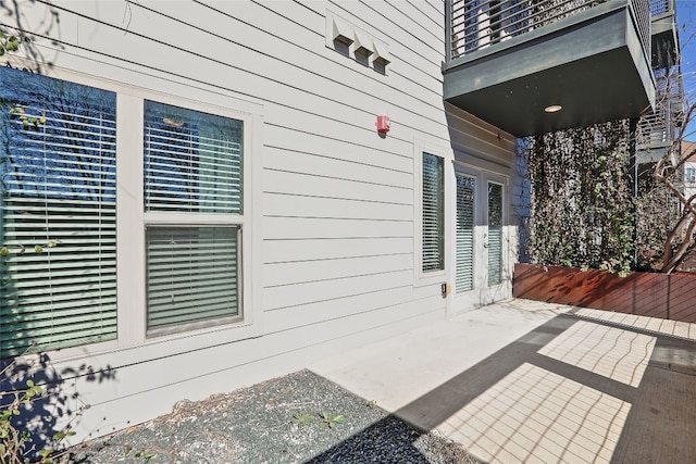 view of patio with a balcony