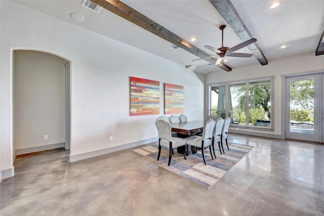 dining room featuring ceiling fan and beam ceiling