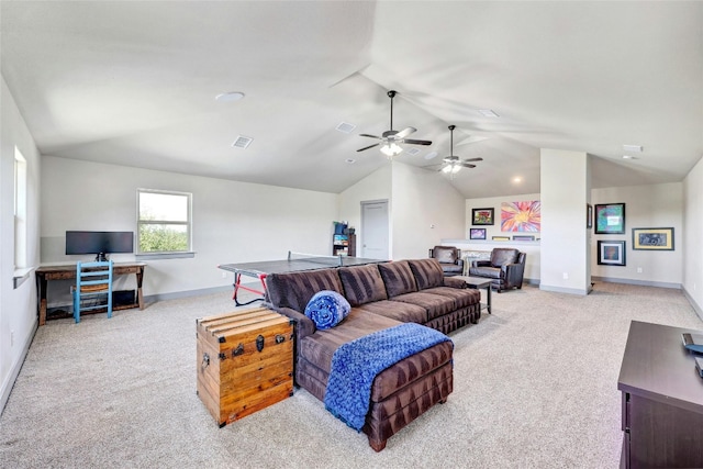 carpeted living room featuring lofted ceiling