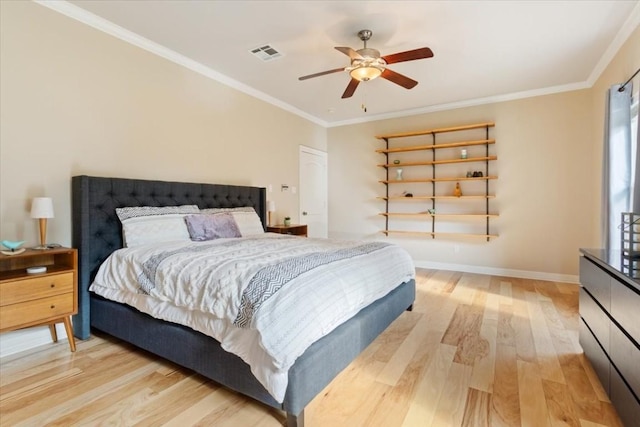 bedroom with crown molding, ceiling fan, and light wood-type flooring