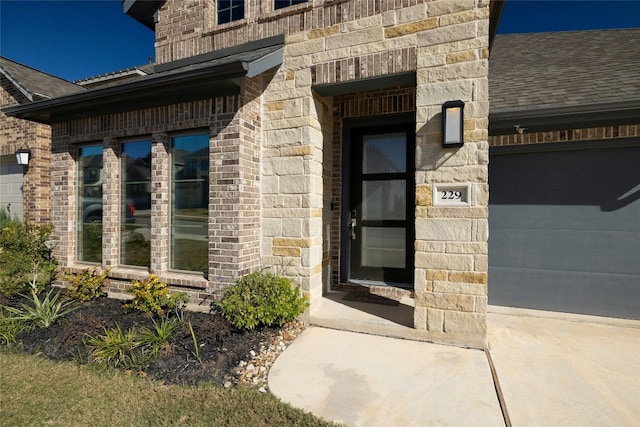 entrance to property with a garage