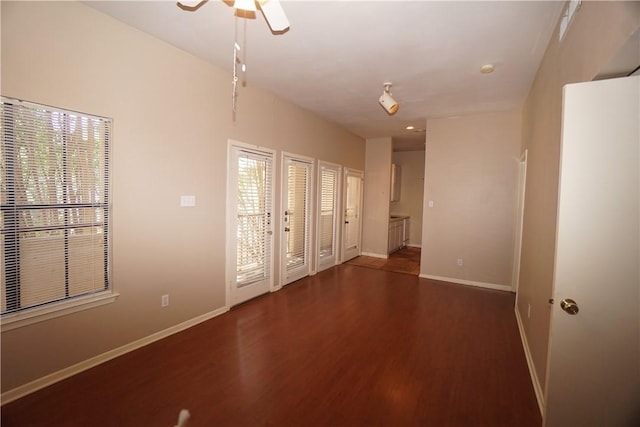 712 Graham Pl Unit 203, Austin, TX 78705 - unfurnished bedroom featuring wood finished floors, access to exterior, and ceiling fan