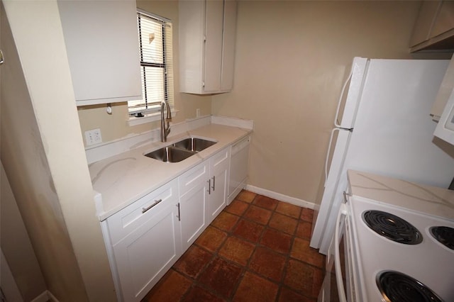 kitchen featuring sink, light stone counters, white cabinets, and white appliances