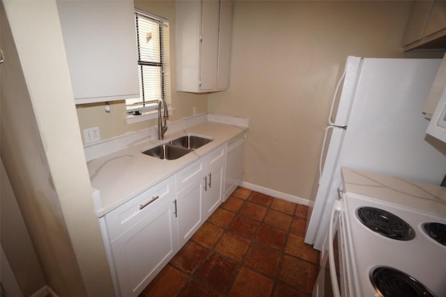 712 Graham Pl Unit 203, Austin, TX 78705 - kitchen with light countertops, white cabinetry, and white appliances
