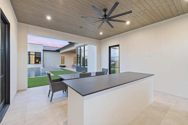 kitchen with wood ceiling and ceiling fan