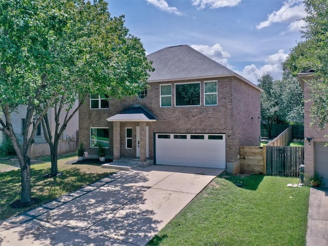 front of property with a garage and a front lawn