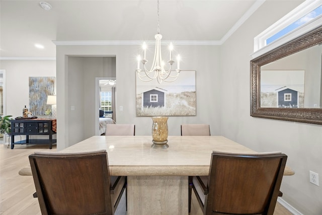 116 Granite Peak Cv, Georgetown, TX 78633 - dining space featuring crown molding, wood finished floors, and a chandelier