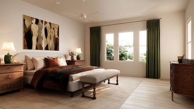 bedroom with ceiling fan and light wood-type flooring