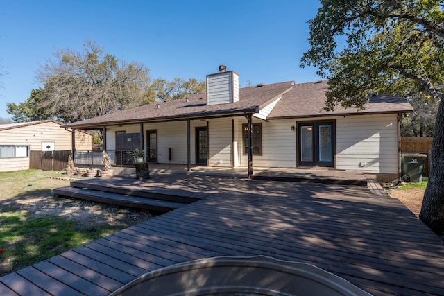 rear view of house with a deck