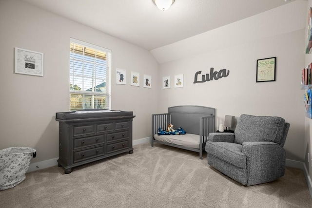 living area featuring lofted ceiling and light colored carpet