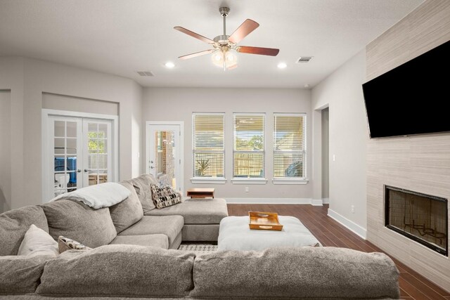 120 Red Granite Rd, Georgetown, TX 78633 - living area with ceiling fan, wood finished floors, baseboards, a fireplace, and recessed lighting