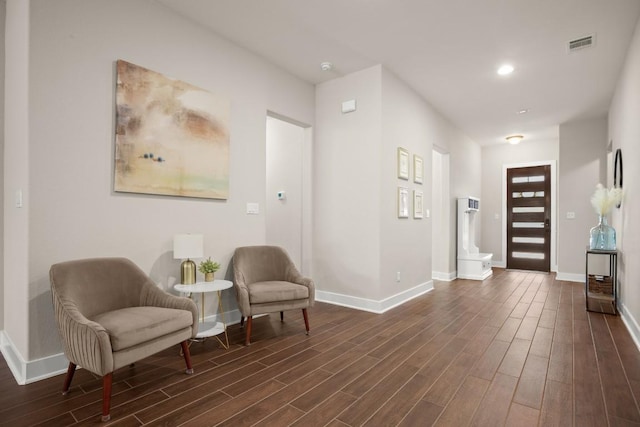 living area featuring dark wood-type flooring