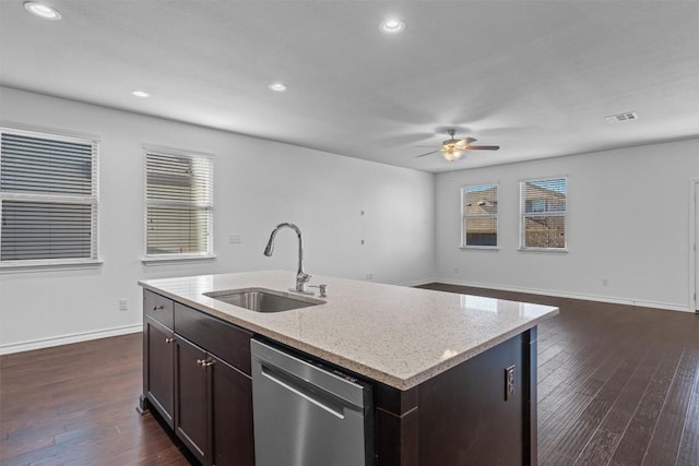 kitchen with dishwasher, sink, a center island with sink, and a healthy amount of sunlight