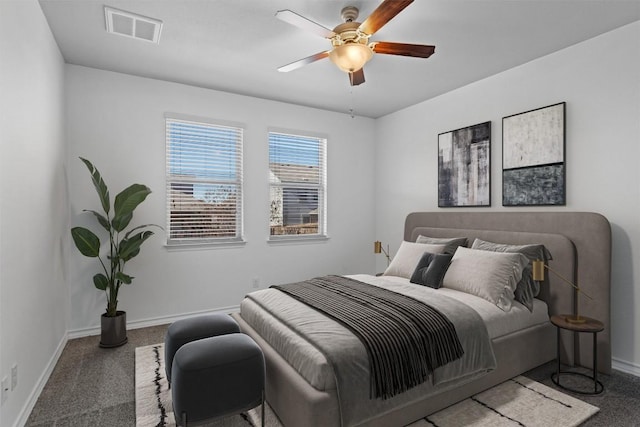 bedroom with ceiling fan and carpet