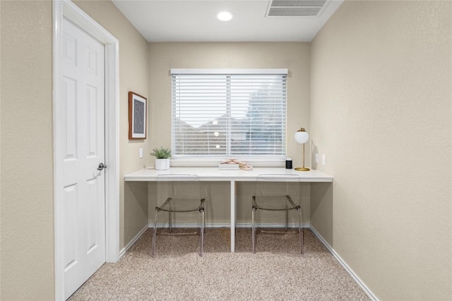 view of carpeted home office