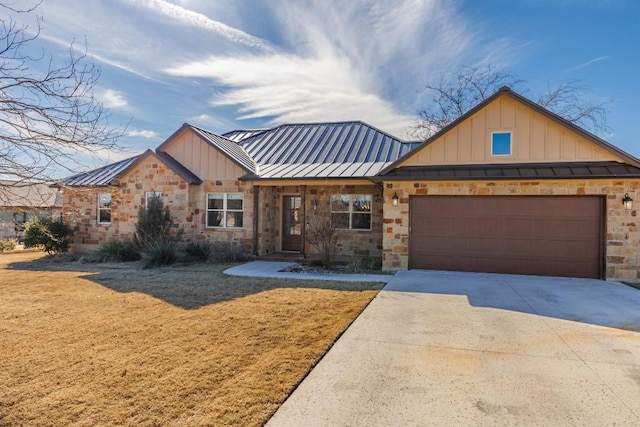 view of front of home with metal roof, a standing seam roof, stone siding, and board and batten siding