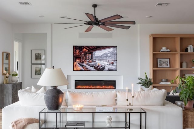 living room with ceiling fan