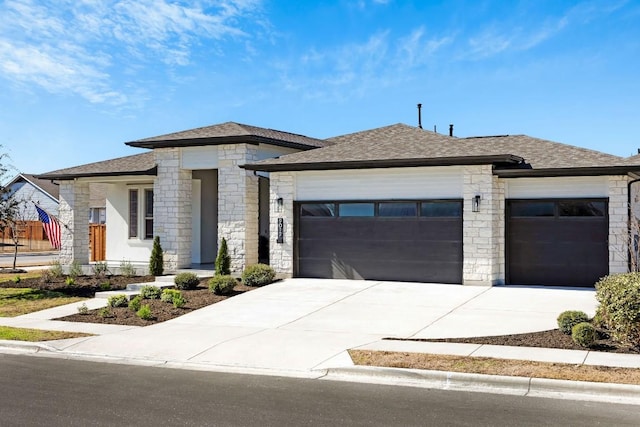 prairie-style house featuring a garage