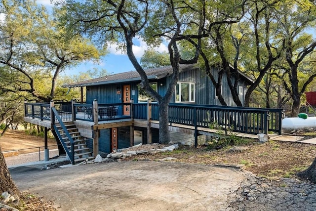 1309 Edgewater Dr, Spicewood, TX 78669 - view of front of property featuring a wooden deck and stairs
