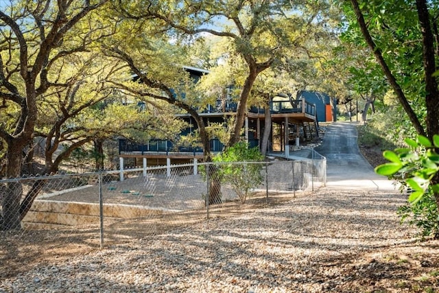 1309 Edgewater Dr, Spicewood, TX 78669 - view of property's community with a fenced front yard