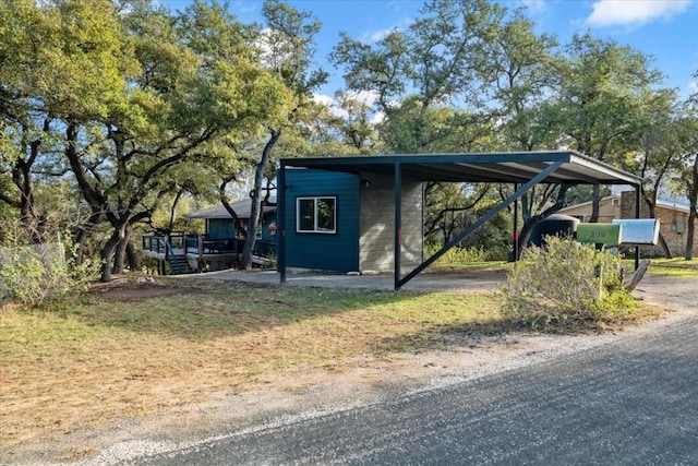 1309 Edgewater Dr, Spicewood, TX 78669 - view of property exterior featuring a carport