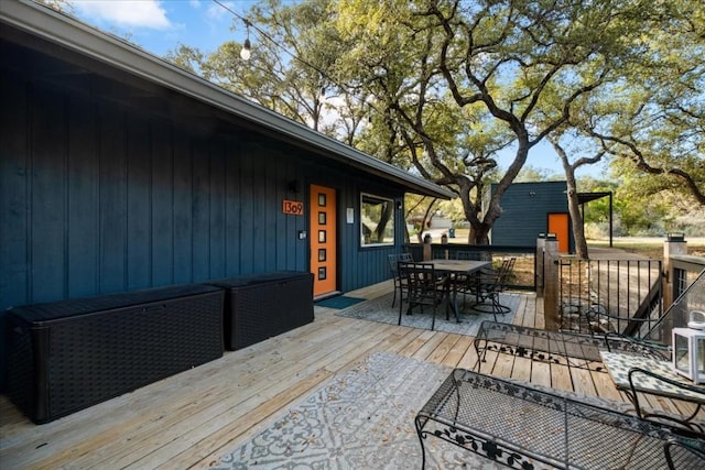 1309 Edgewater Dr, Spicewood, TX 78669 - deck with outdoor dining area