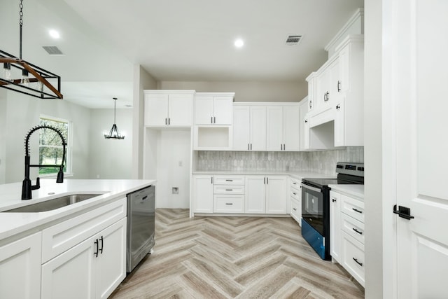 kitchen featuring white cabinetry, electric range oven, stainless steel dishwasher, and sink
