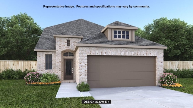 view of front of home with an outbuilding and a front yard