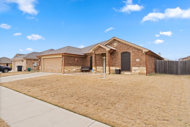 ranch-style home with a garage