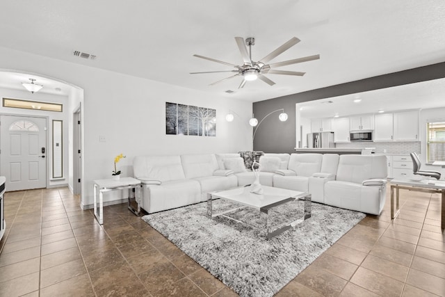 living room with ceiling fan