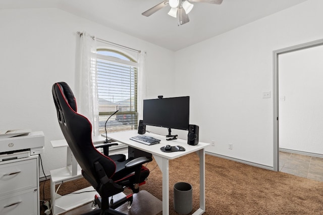 home office featuring light colored carpet and ceiling fan