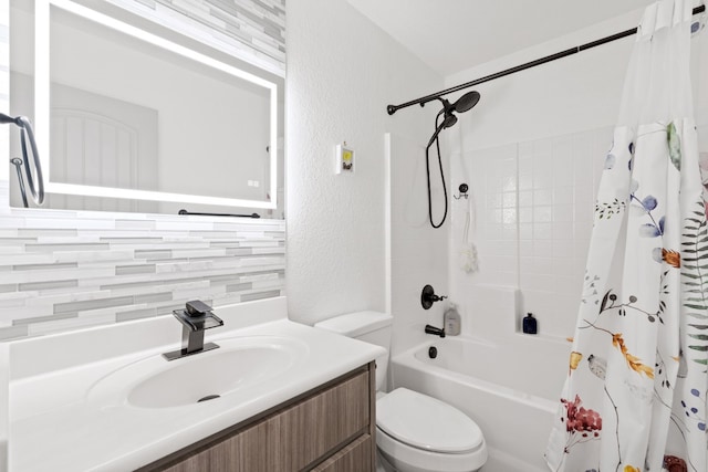 full bathroom with tasteful backsplash, vanity, shower / tub combo, and toilet