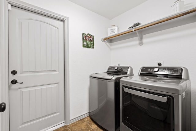 washroom featuring separate washer and dryer