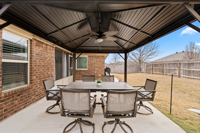 view of patio / terrace featuring a gazebo and ceiling fan