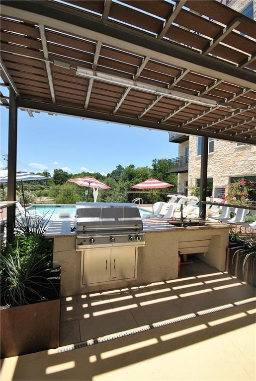 view of patio with exterior kitchen and grilling area