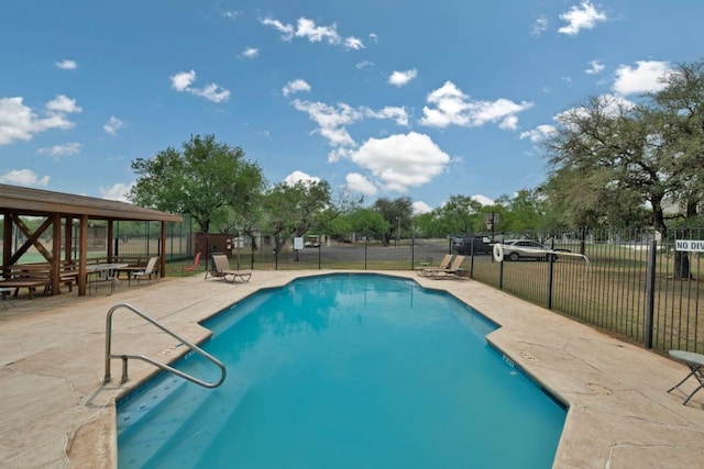 view of swimming pool featuring a gazebo and a patio