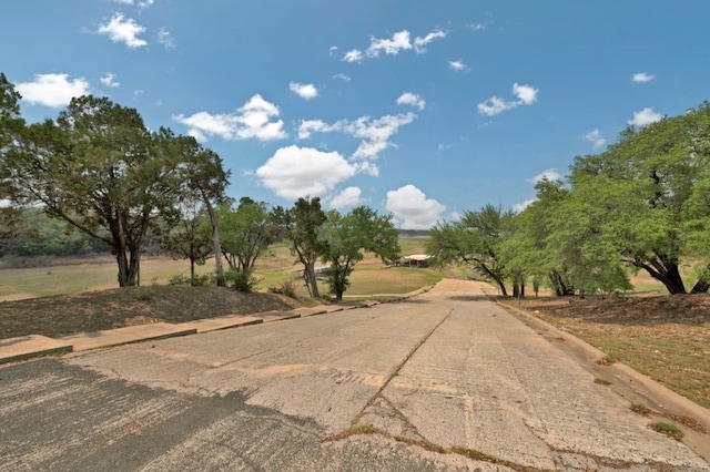 view of street featuring a rural view