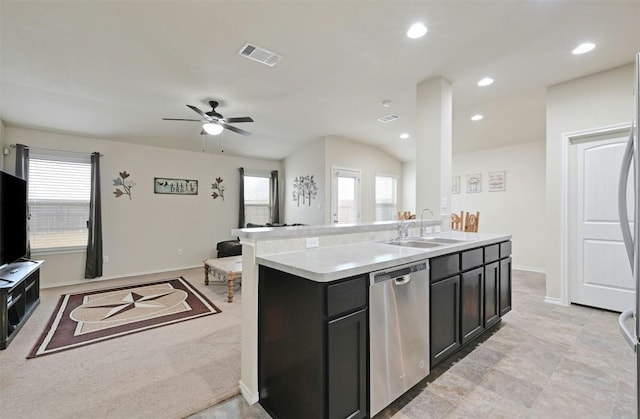 kitchen with a kitchen island with sink, sink, a wealth of natural light, and dishwasher