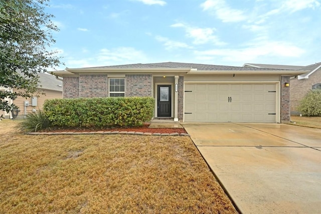 ranch-style house with a garage and a front lawn