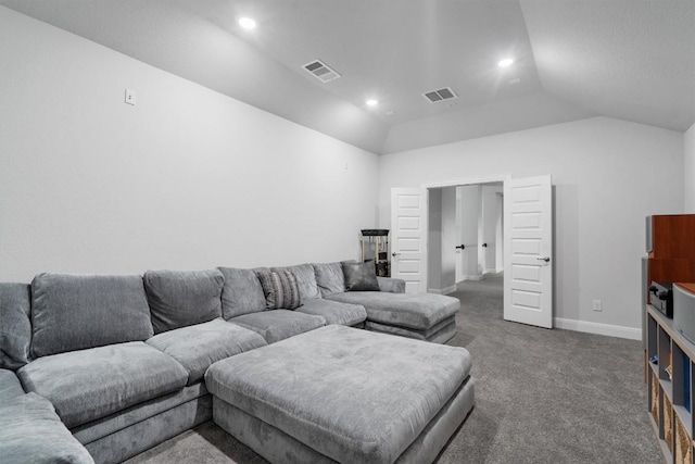 living room with lofted ceiling and dark carpet