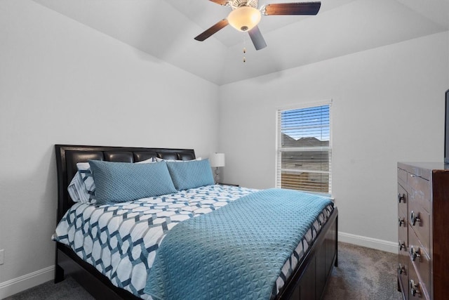 bedroom featuring lofted ceiling, dark carpet, and ceiling fan