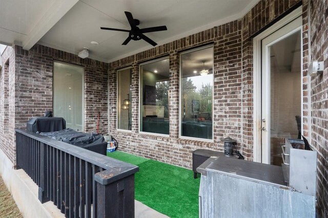 view of patio with ceiling fan