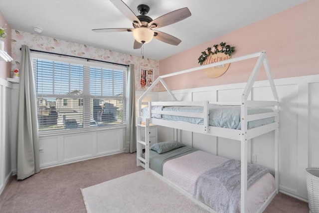 bedroom with light colored carpet and ceiling fan