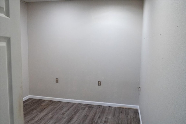 empty room featuring dark hardwood / wood-style floors