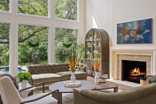 sunroom with a premium fireplace