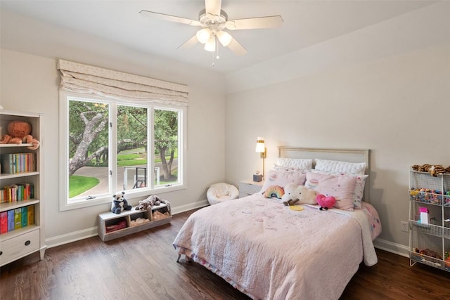 bedroom featuring dark hardwood / wood-style flooring and ceiling fan