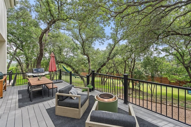 deck featuring a fire pit