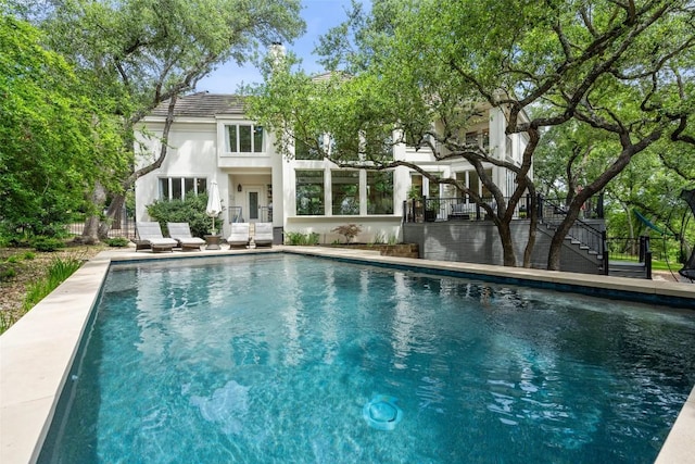 view of pool featuring a patio