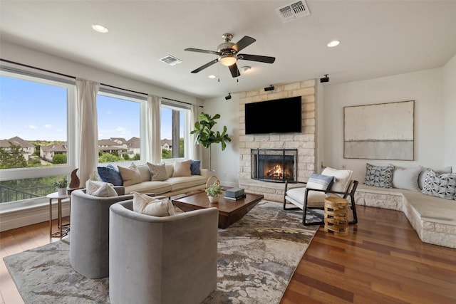 10709 Pointe View Dr, Austin, TX 78738 - living room featuring a ceiling fan, wood finished floors, a fireplace, and recessed lighting